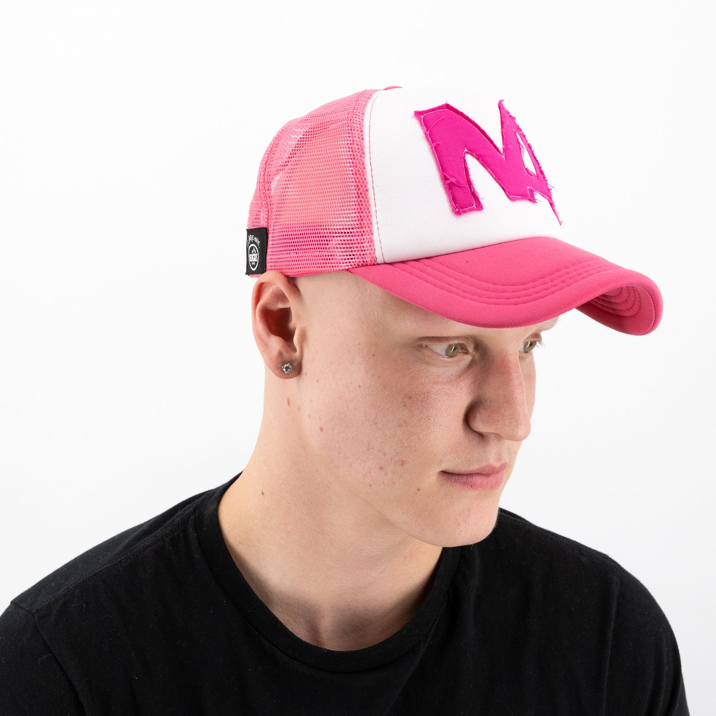 pink trucker hat